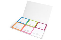 Several memo pads in one cover
